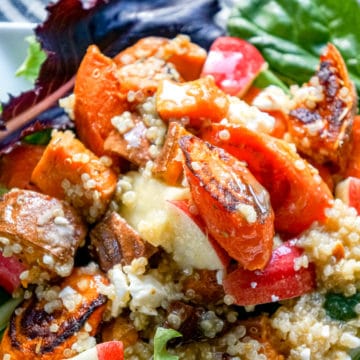 Roasted sweet potatoes and carrots tossed with feta cheese, fresh apples, quinoa, and served over a bed of mixed greens.