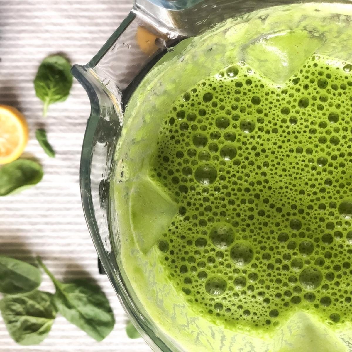 green smoothie in a blender. 