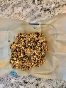 No-bake bar mixture in a baking dish ready to be pressed down.