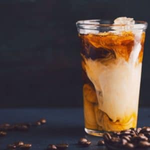Iced coffee and cream in a glass